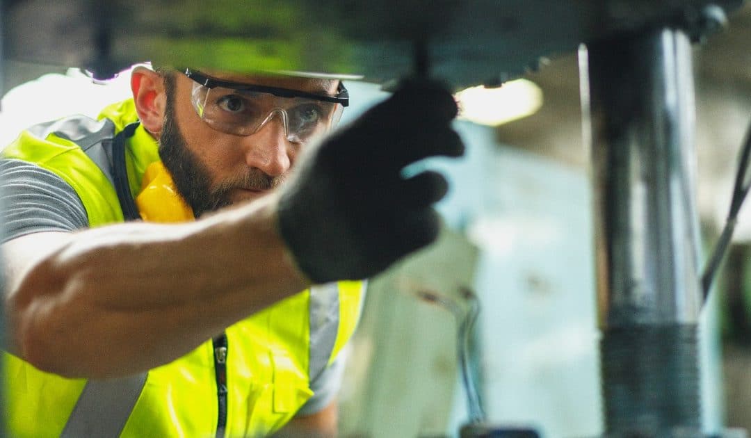 Worker wearing safety glasses
